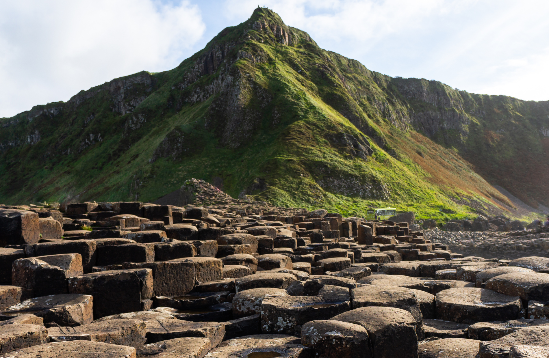 mountain with large stones in the foreground