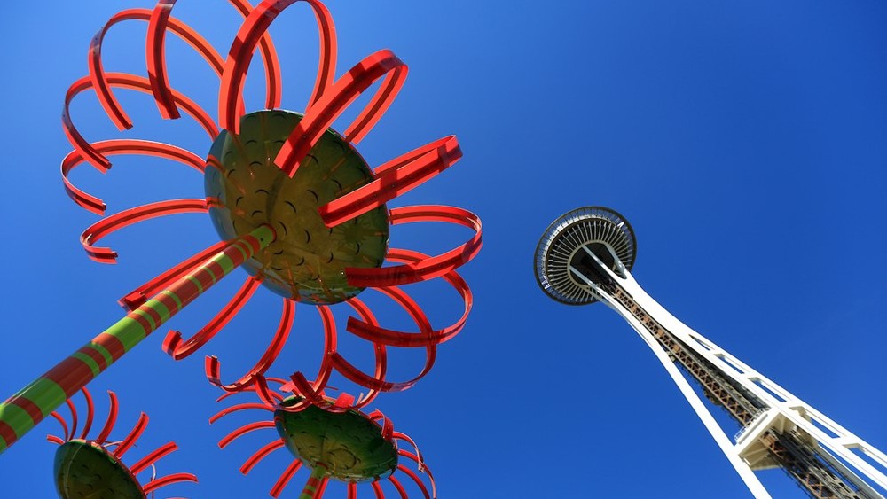 The Space Needle and Chihuly sculptures that tilt in toward one another
