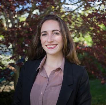 Photo of Megan Grosse in front of trees