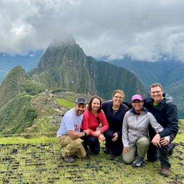 Laura Hauck-Vixie and other students overlooking mountain