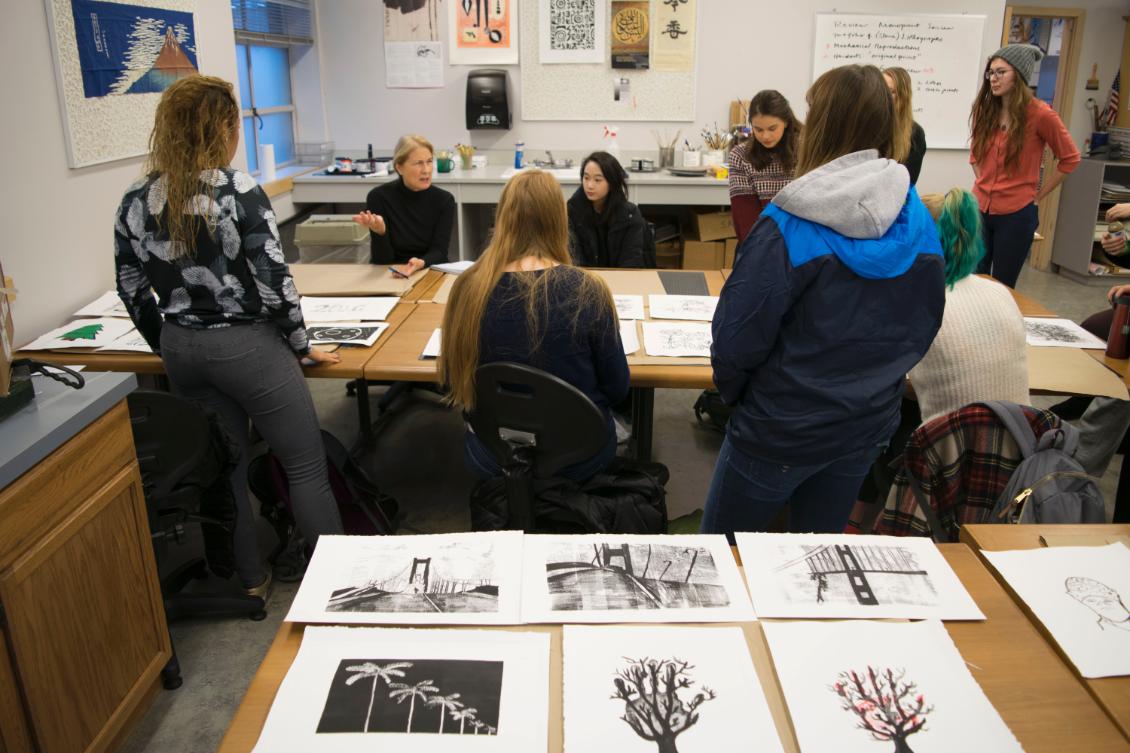 Photo of students working in printmaking studio