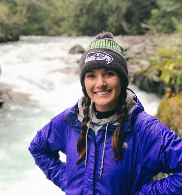 Photo of Caylah Lunning in front of river