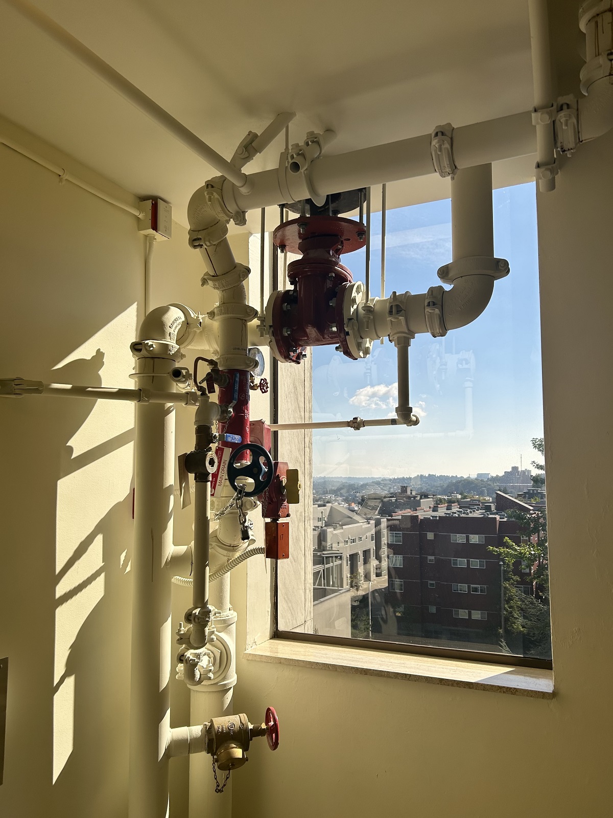 Photo of pipes against a window