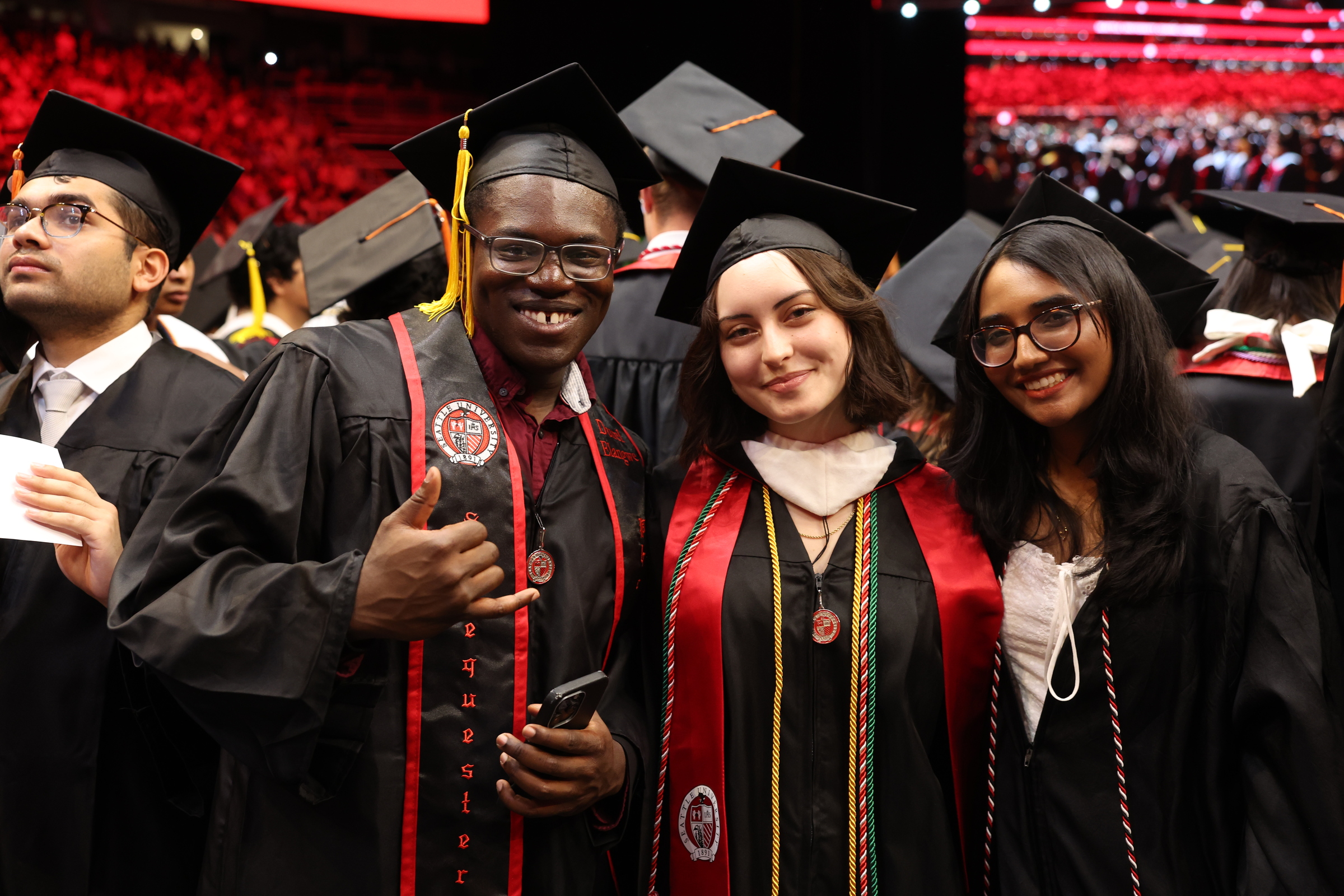 UG Commencement smiling trio.jpeg