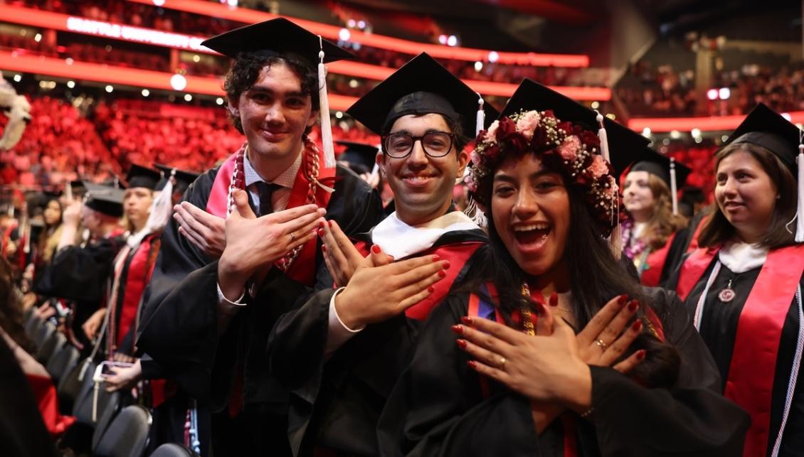 UG Commencement trio with hawk wings.jpeg