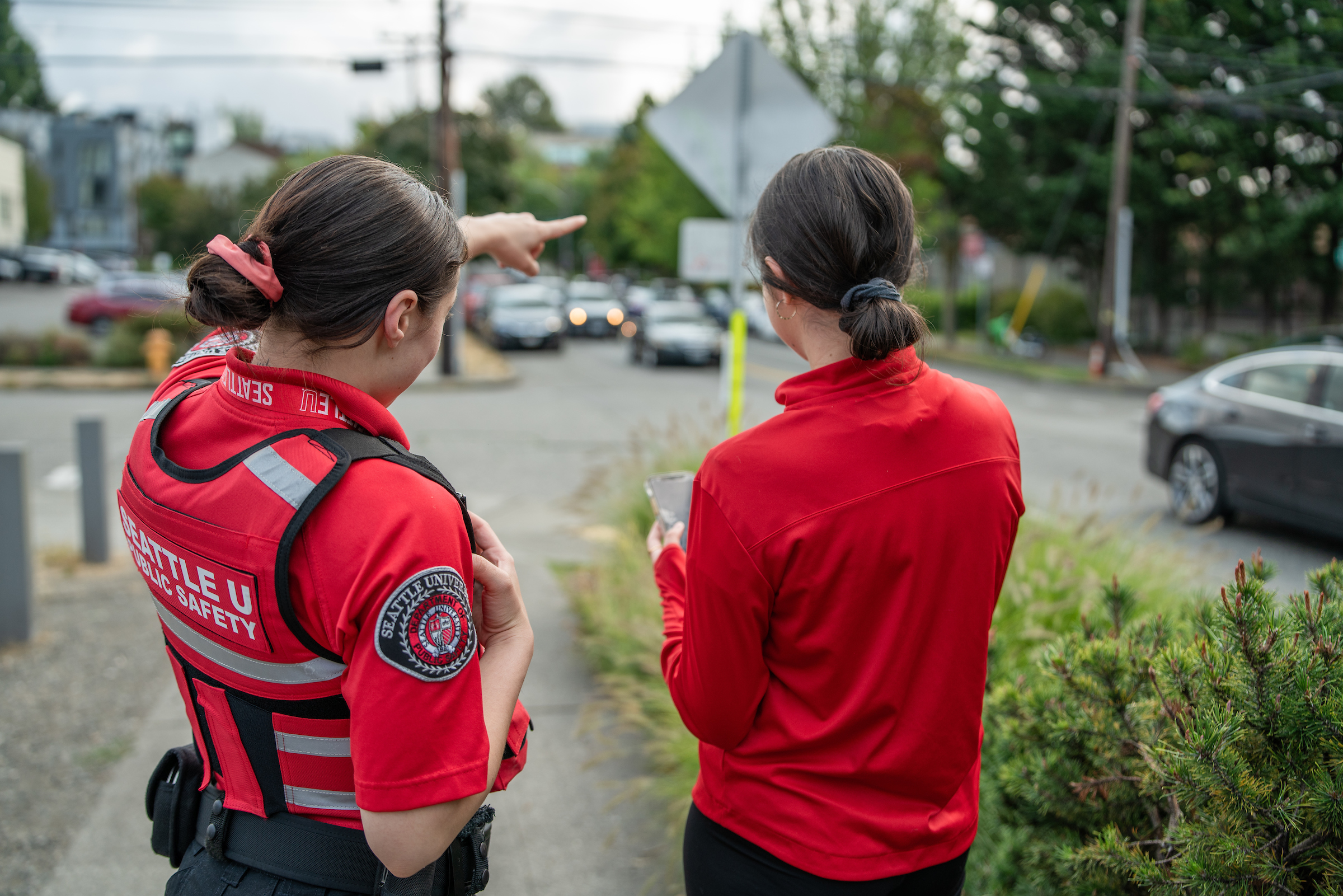 DPS officer giving directions to a student