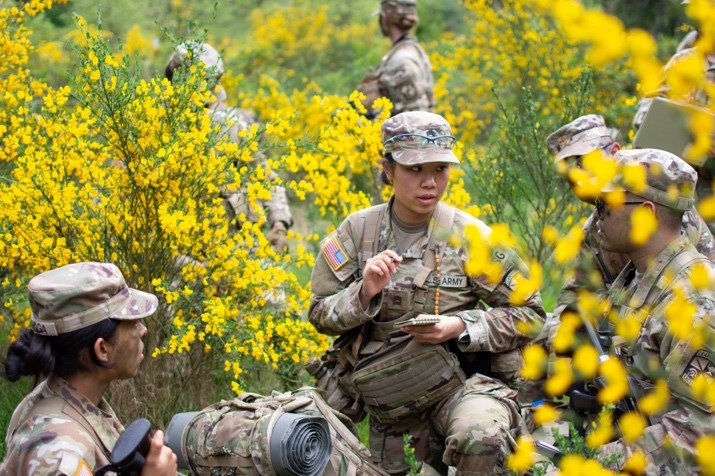 Cadets out in field yellow flowers