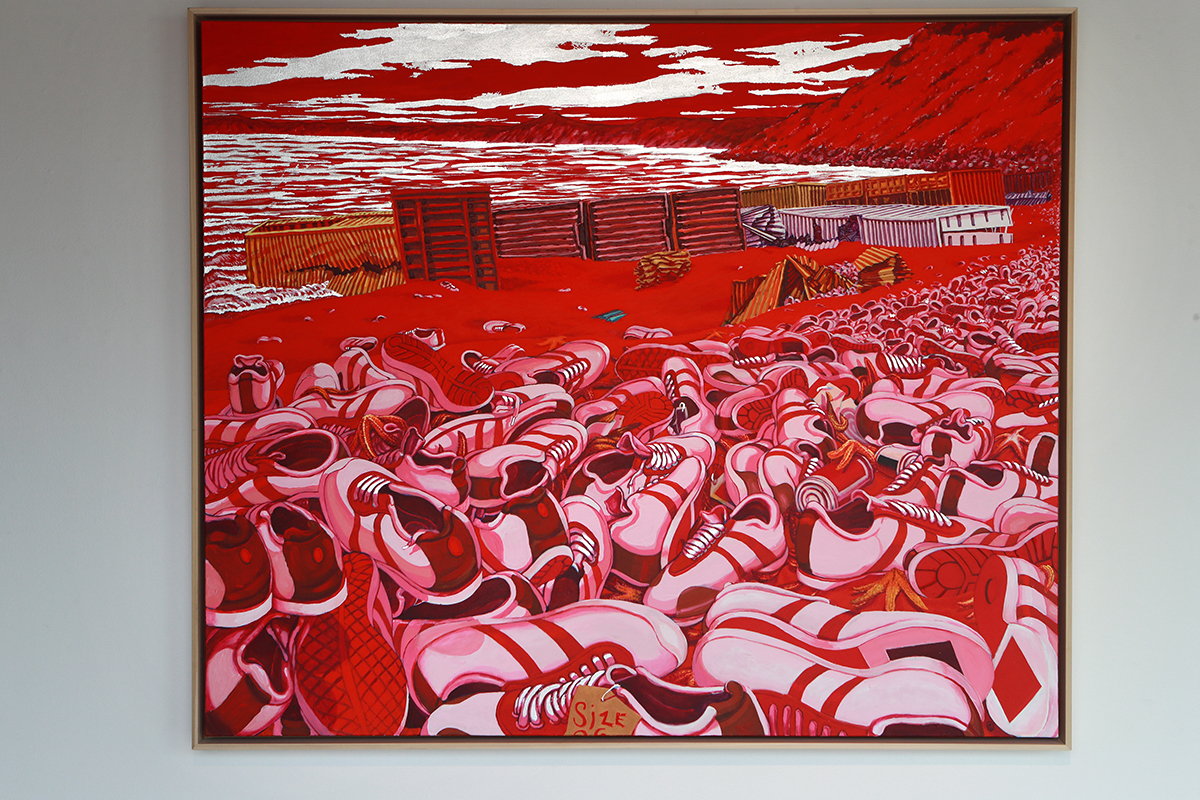 Painting of many pink shoes piled on a red beach with red and silver water and sky