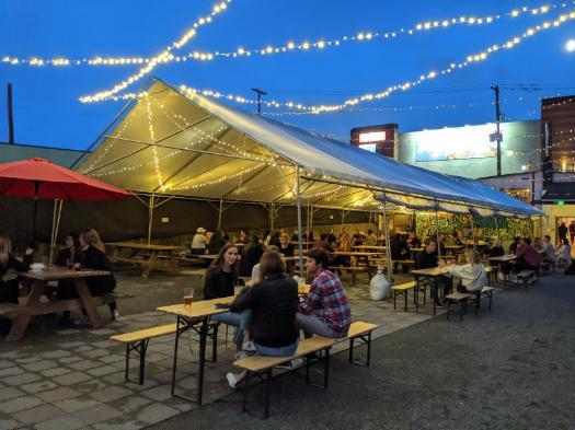 A photo of outdoor dining at Peddler Brewing Company