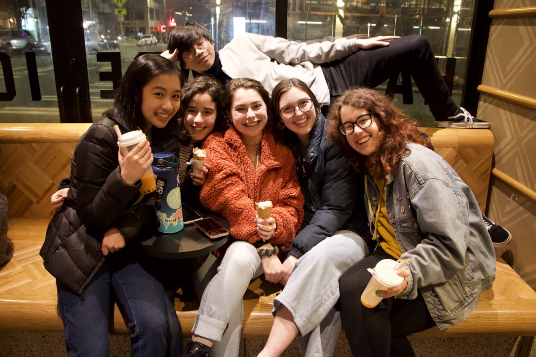 a photo of the 6 sustainability reps posing happily on a bench at an ice cream place