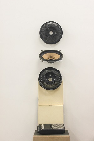 artwork with speakers and tape recorder