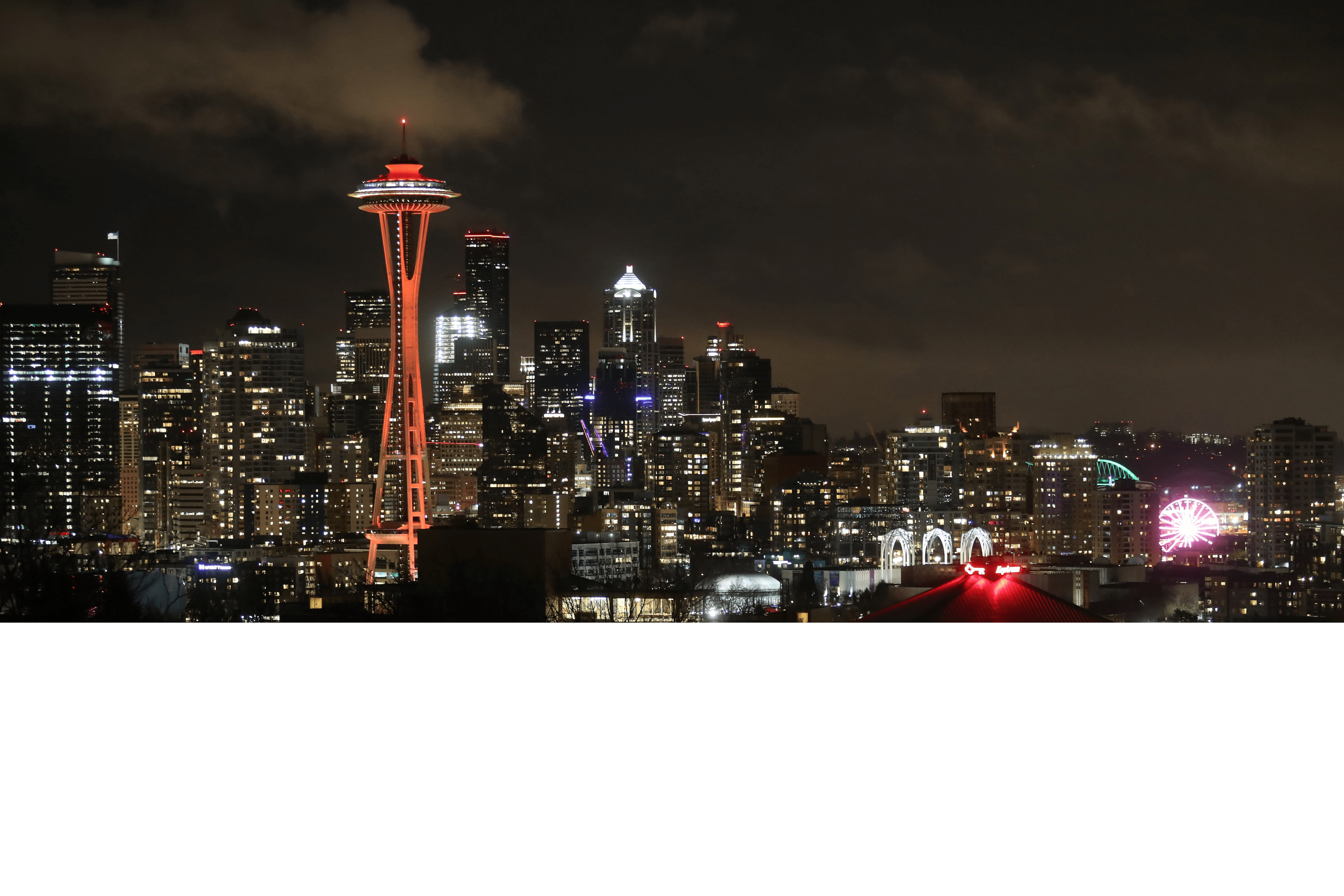 Seattle Skyline lit up in red
