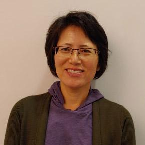 Headshot of nursing faculty member Dr. Mo Sin