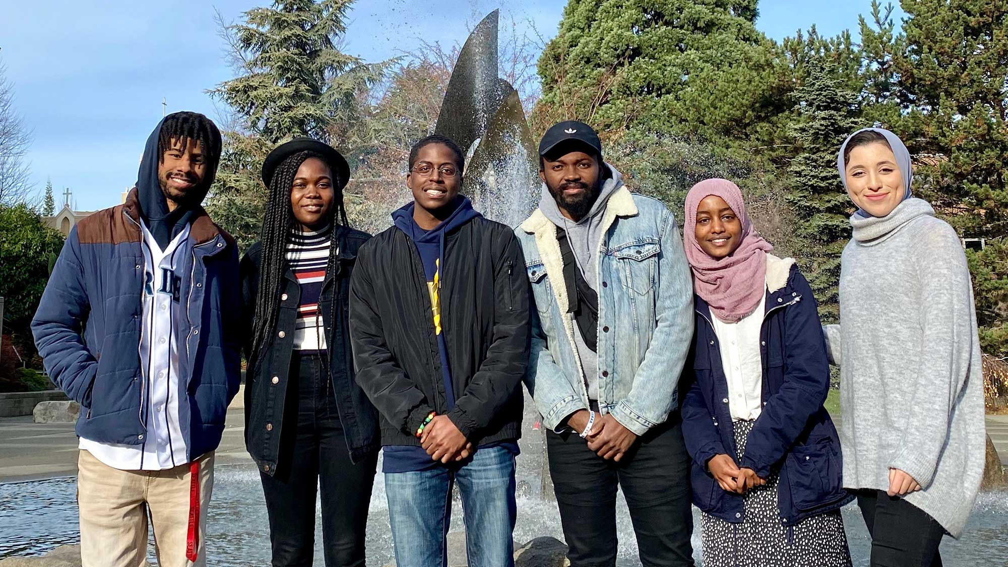 Students in the National Society of Black Engineers at the Quad Fountain