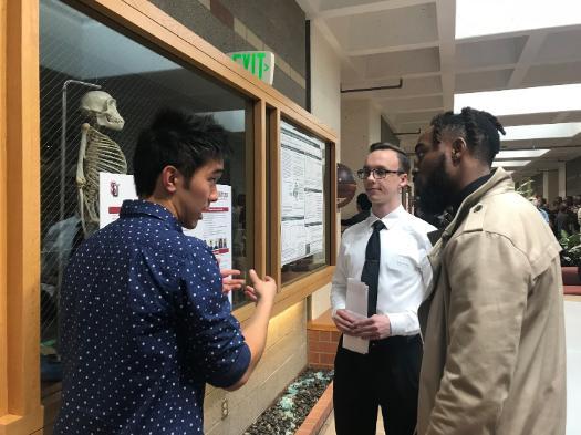 students presenting their computer science research at the Undergraduate Poster Session