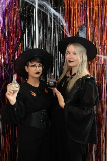 duo dressed as witches for contest