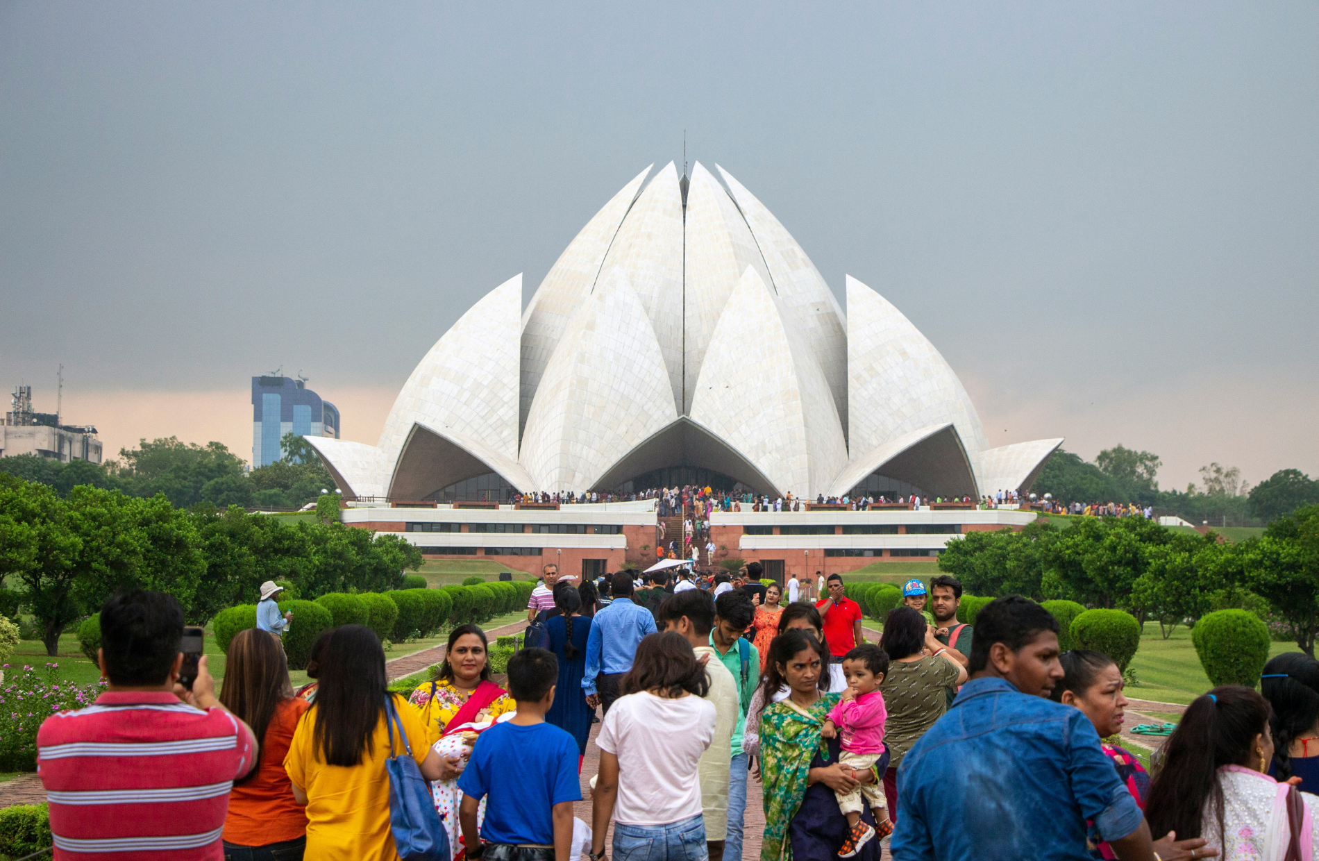 People in front of an Indian Lotus Temple