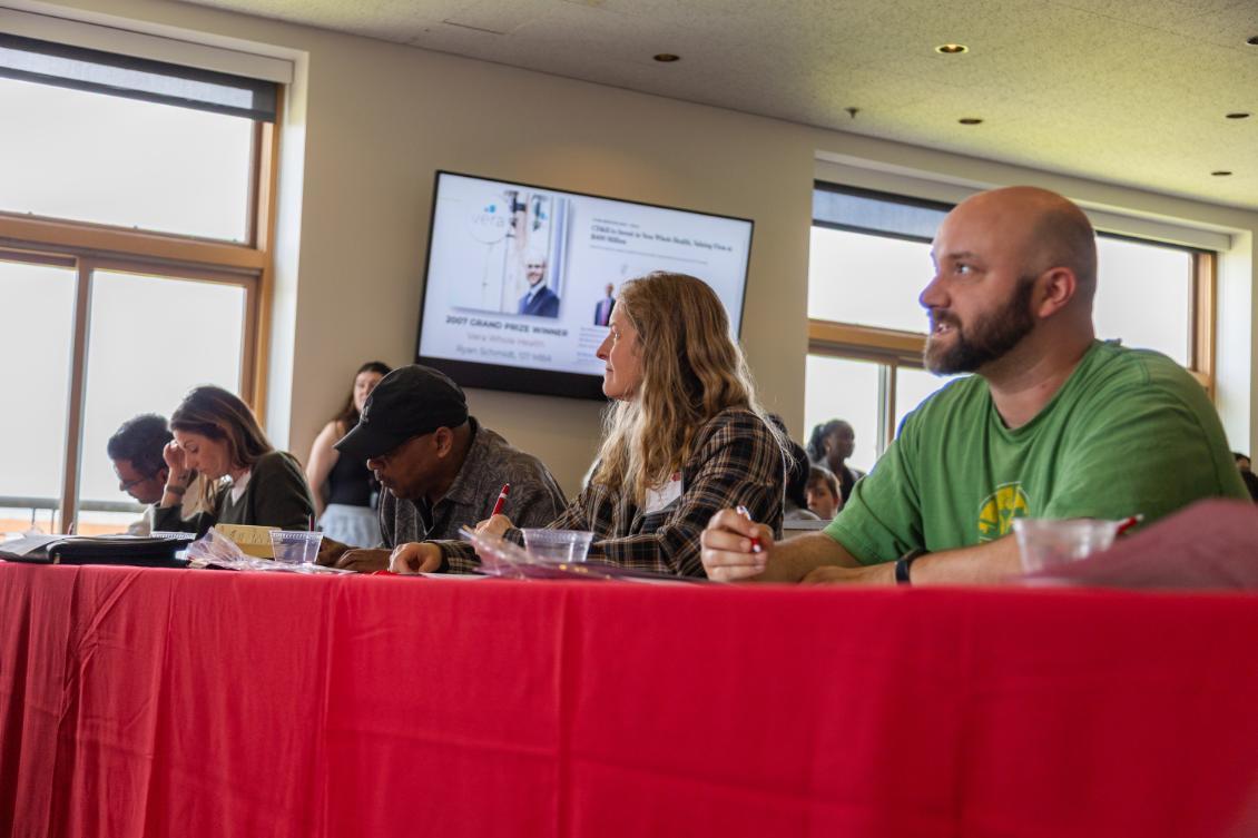 Judges scoring the pitch competition at the Harriet Stephenson Business Plan Competition Pitch Competition