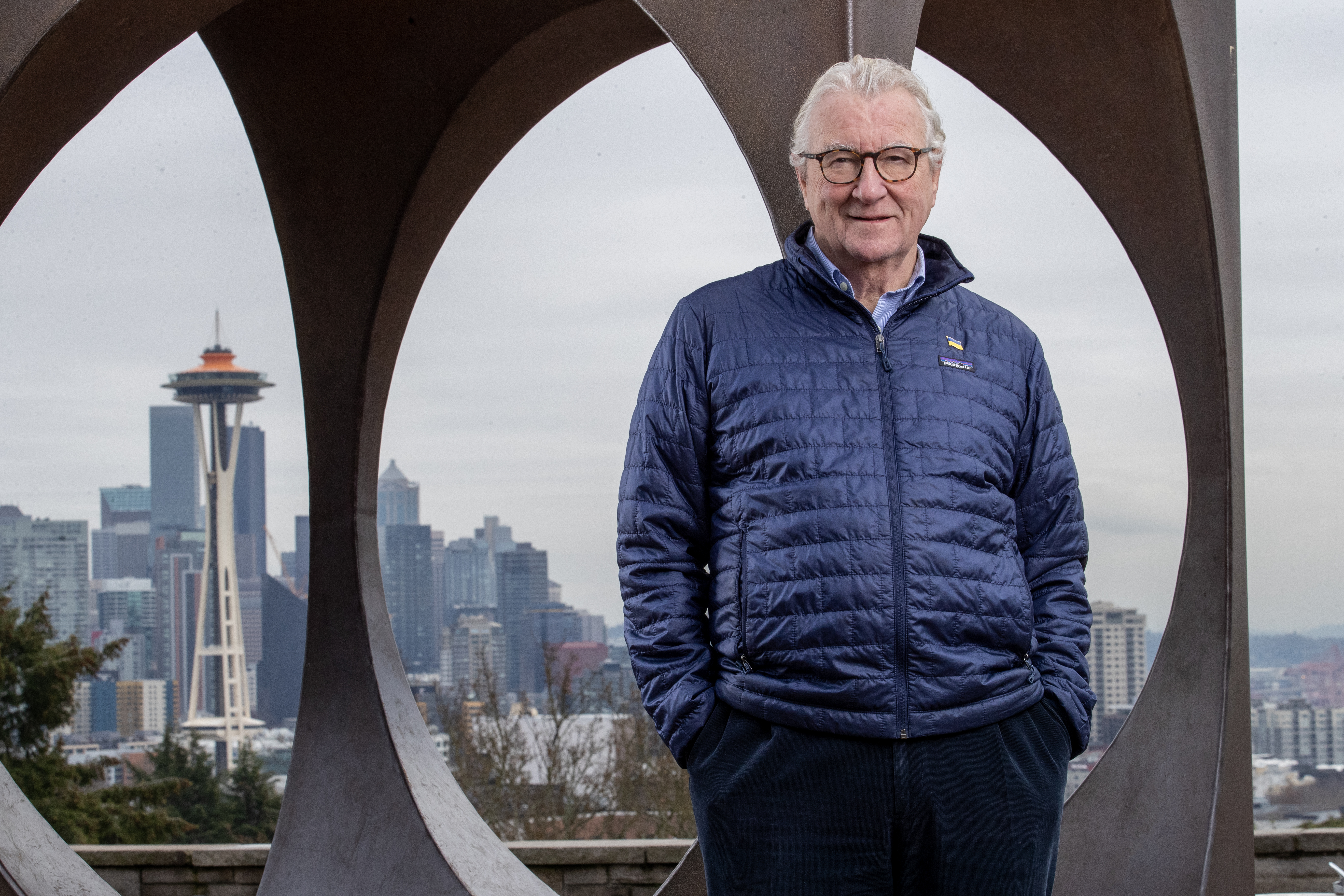 Rom Roach posing with space needle in background