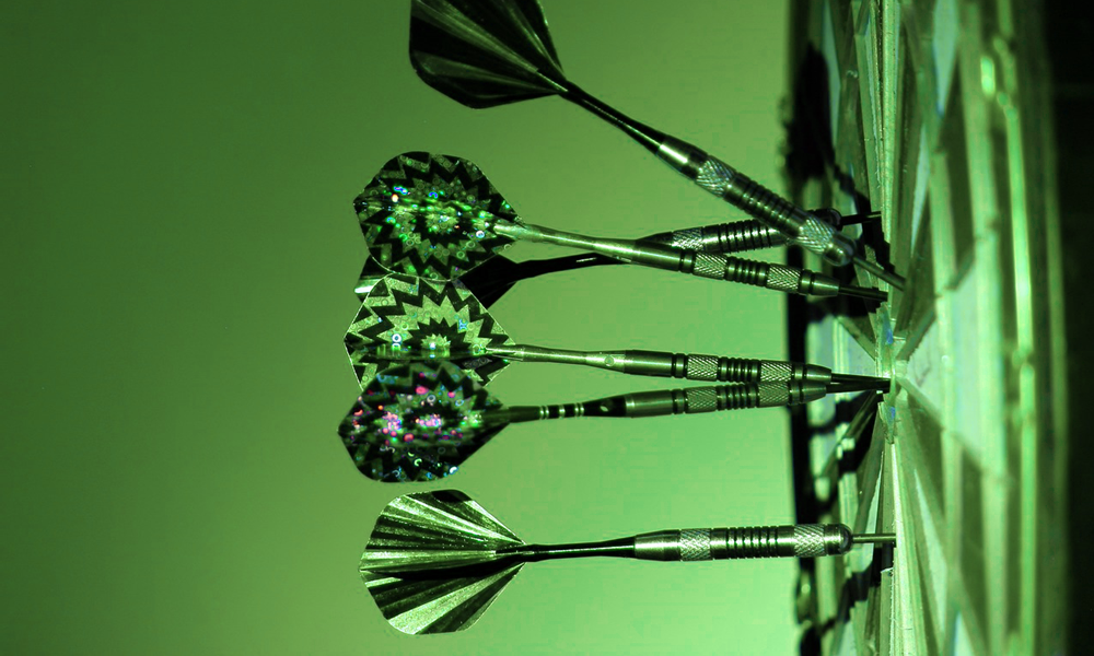 Photo of darts in a dartboard