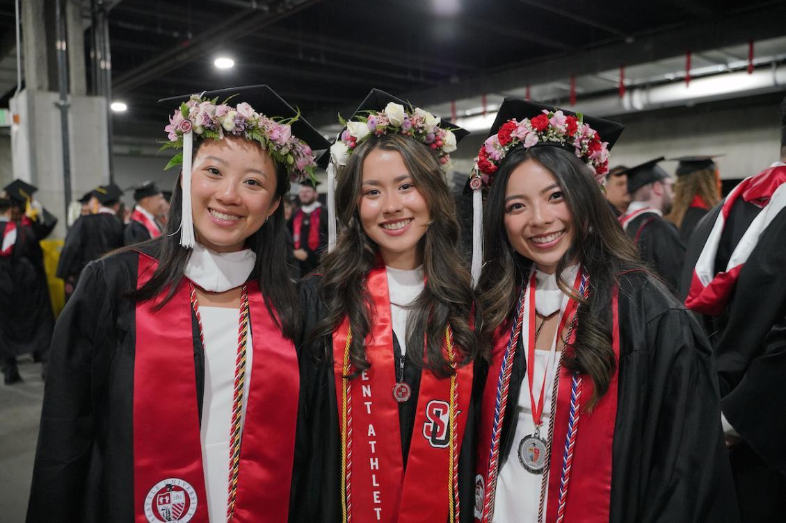 UG Commencement smiling girls