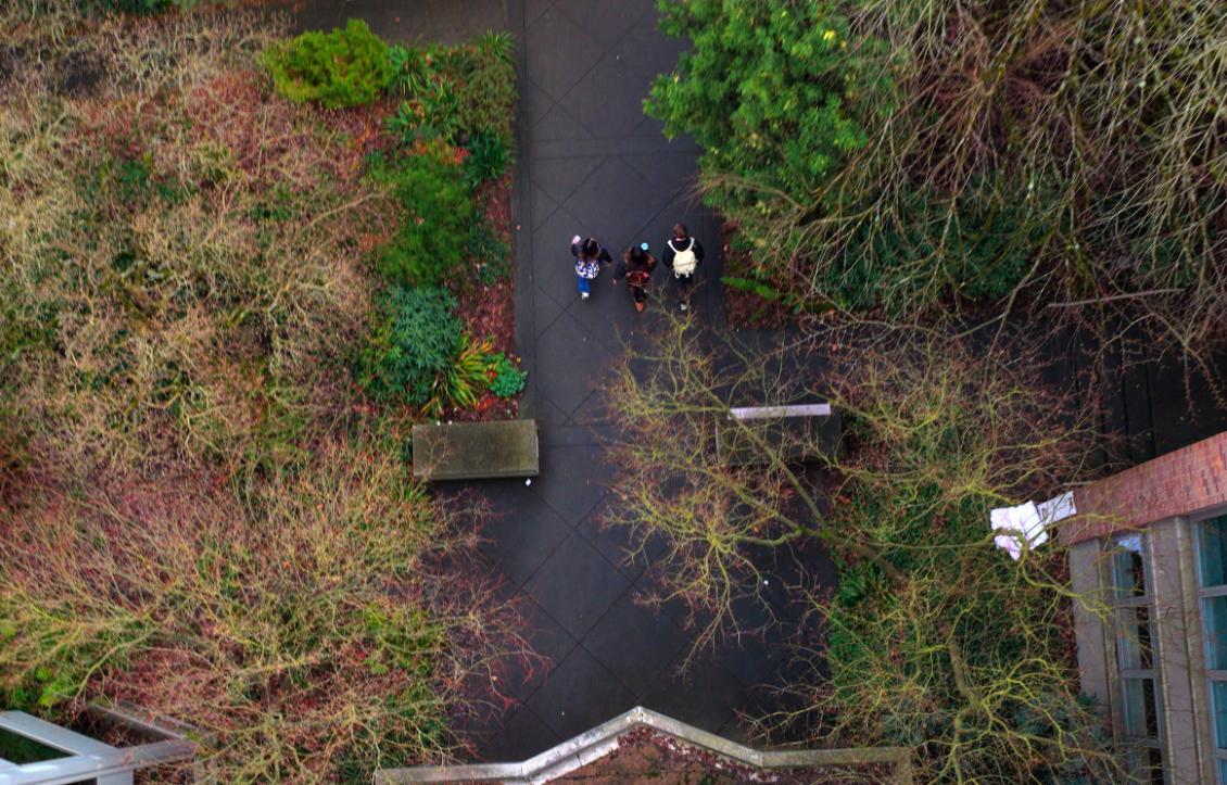 A aerial photo of SU campus with students walking