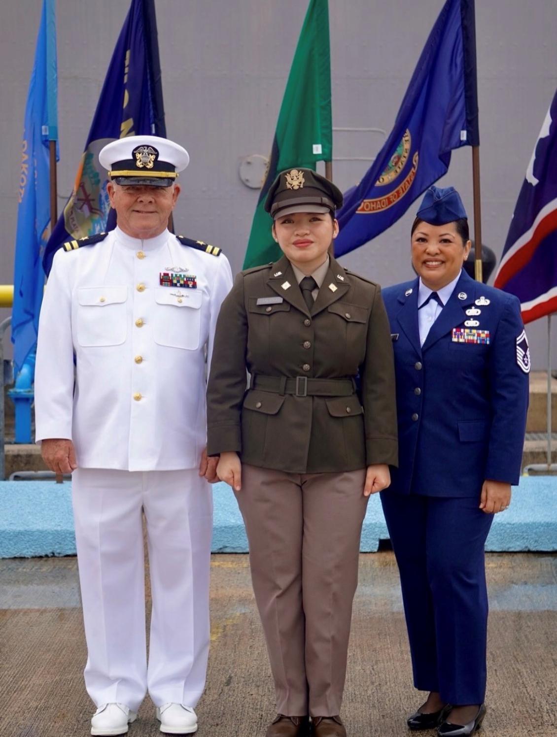 Cadet between two officers