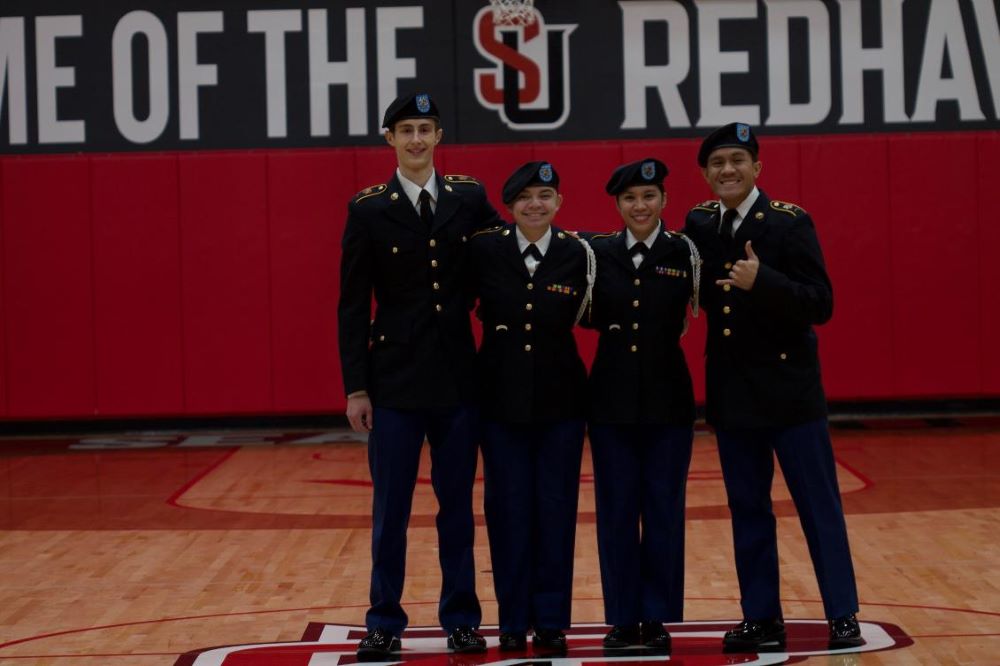 Four Cadets in dress uniform no flags