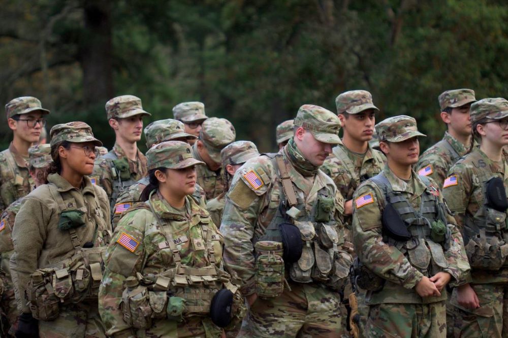 Cadets standing outside large group