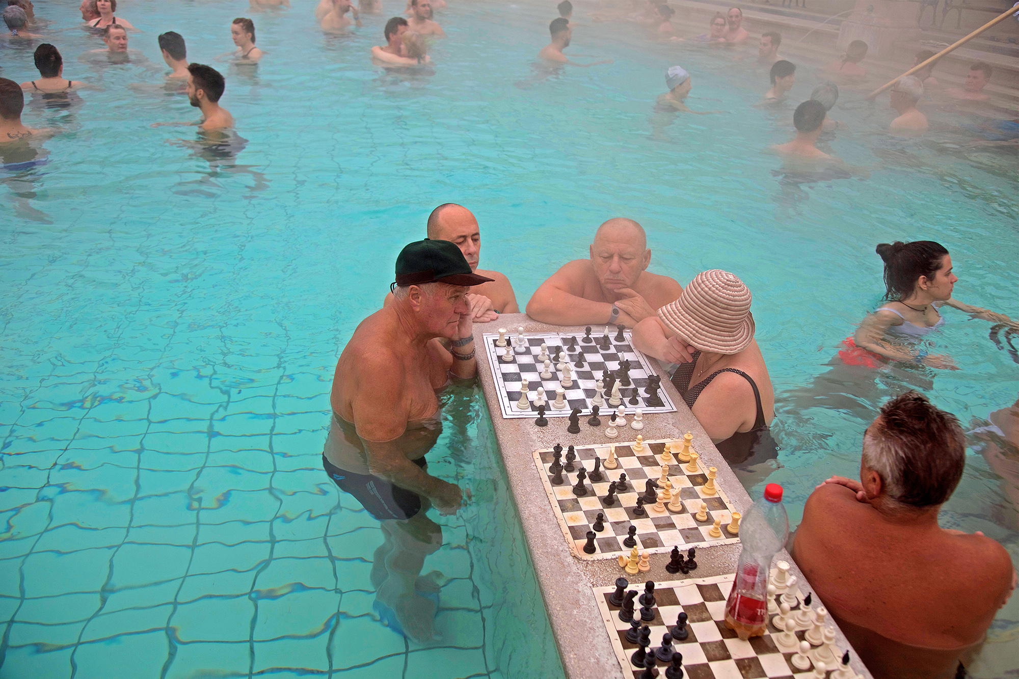 bathers play chess in the thermal baths of Budapest