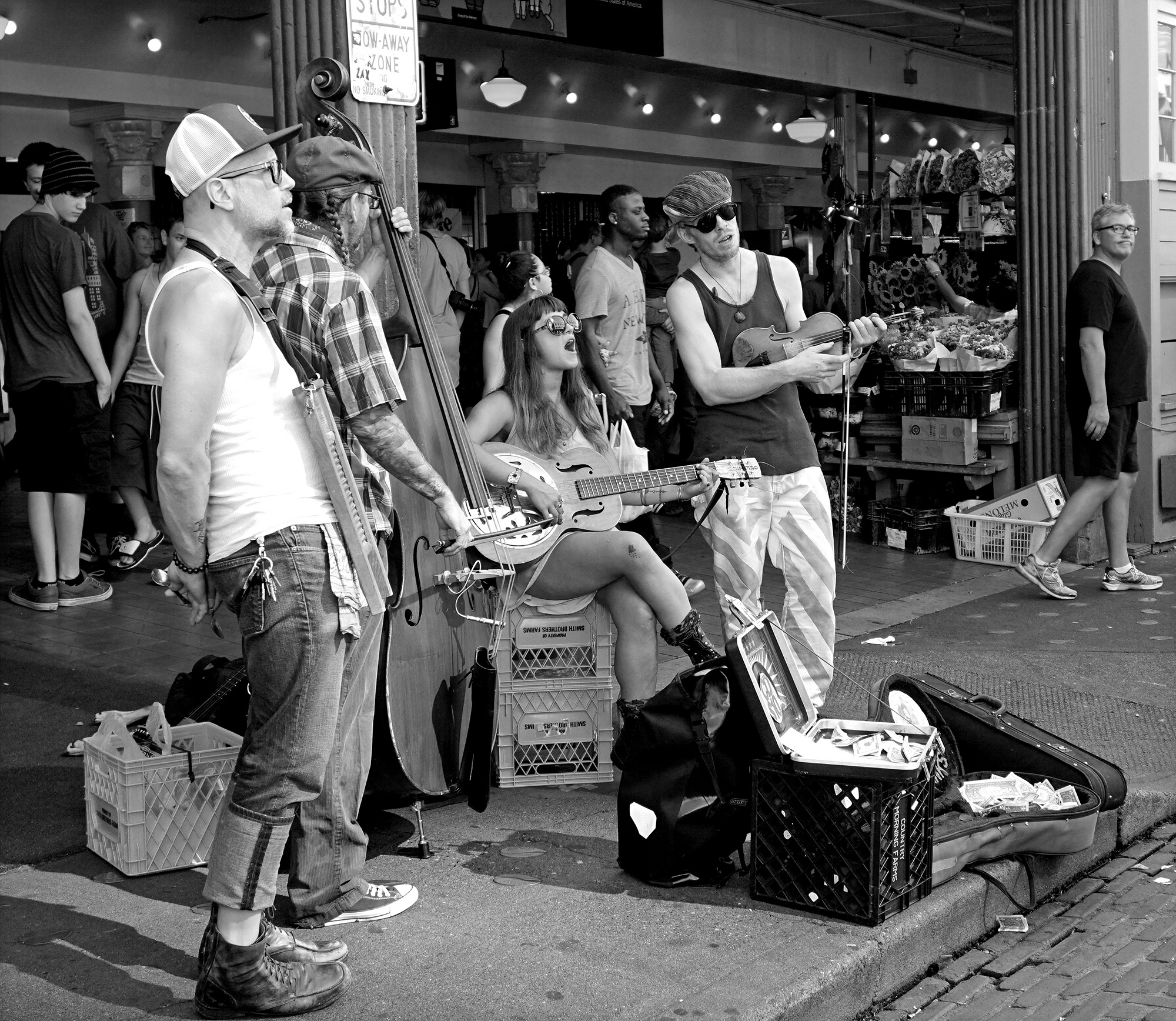 black and white photo of buskers at the Pike Place Market