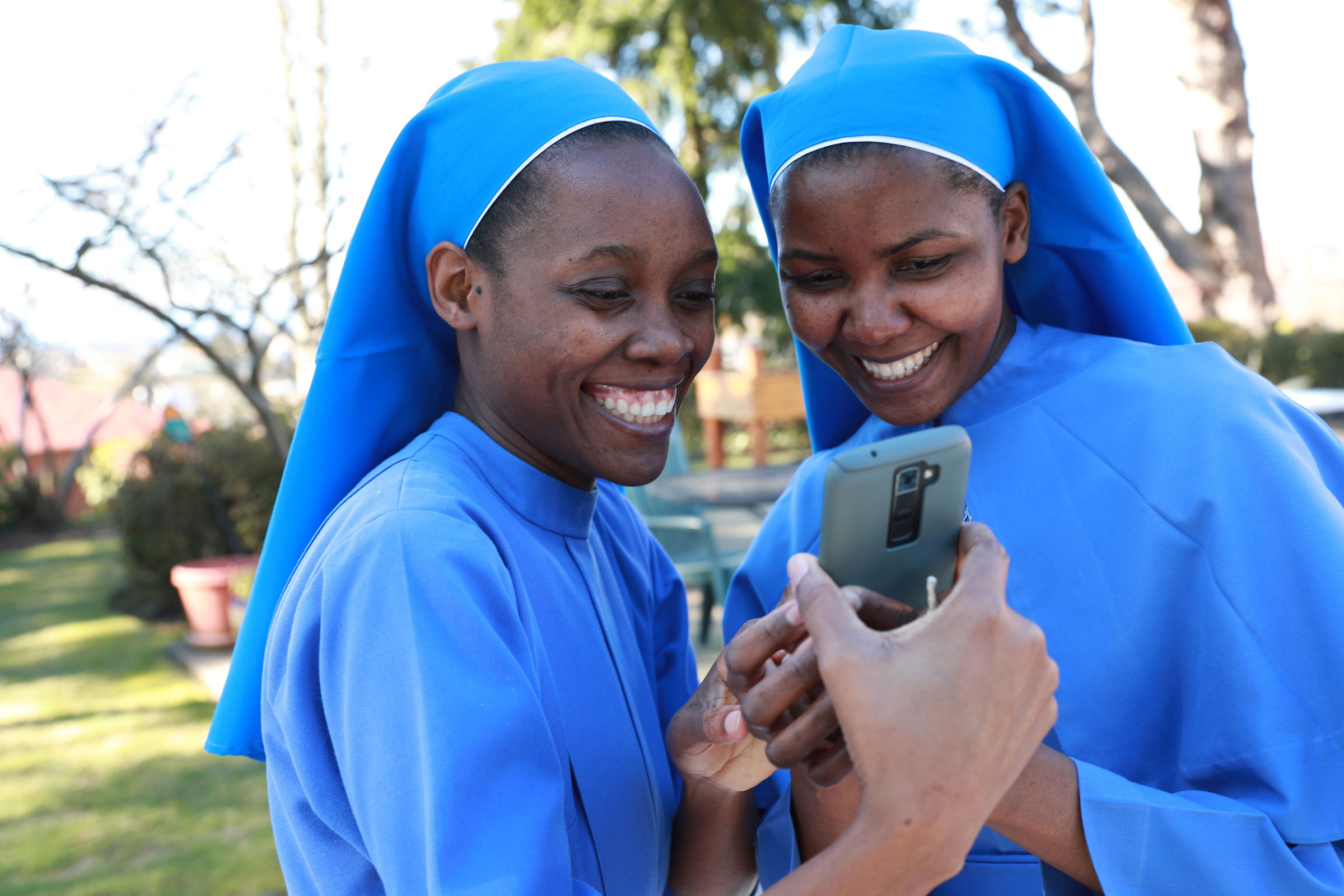 Sister Mary Namutebi, DM, '20, '22, left and Sister Paskazia Ampronia Nakitende, DM, '19