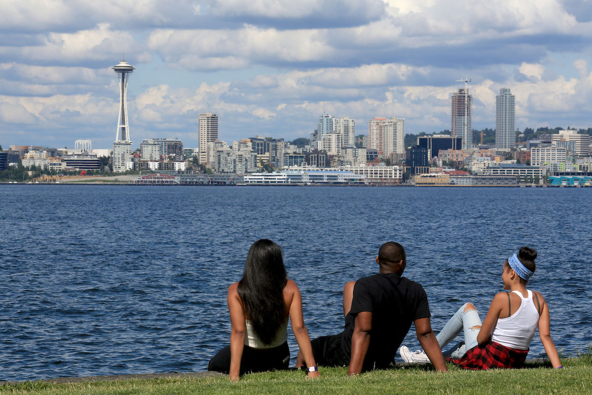 Students admiring the view of the Space Needle from a nice spot on Alki Beach