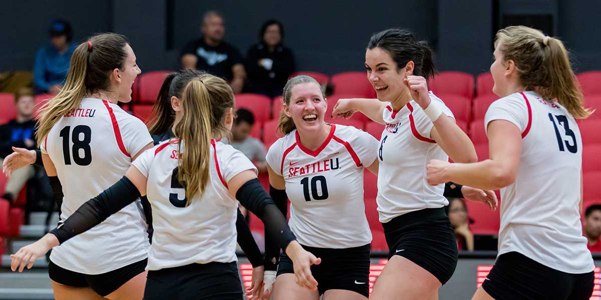 Seattle University Volleyball Team celebrates after victory against New Mexico State on 10-5-17