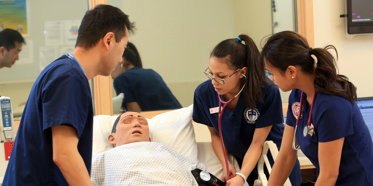 Seattle U Nursing Students performing mock procedures