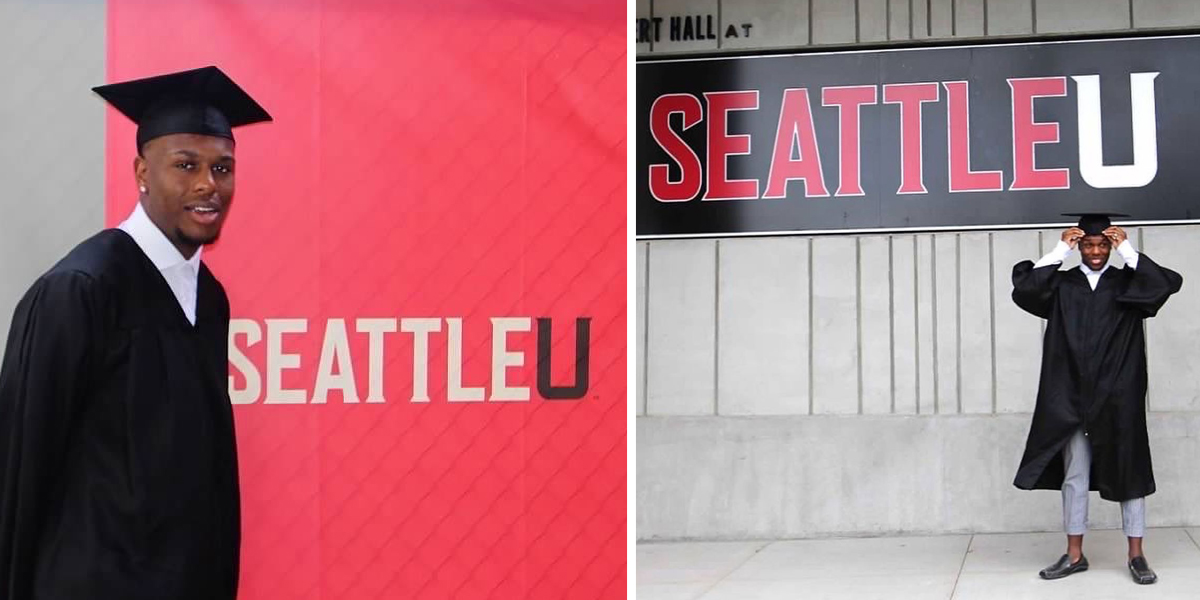 Seth Chism standing in graduation cap and gown in front of Seattle U signage.